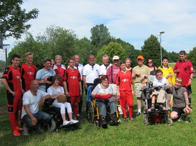 Fußball-Team mit Fotografen